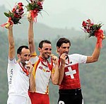 Le podium de la course en ligne aux Jeux Olympiques 2008 � Beijing: Rebellin (argent), Sanchez (or), Cancellara (bronze)